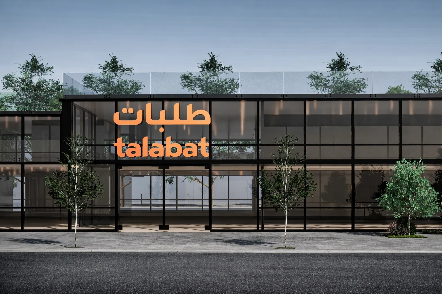 Contemporary workplace façade with illuminated Talabat signage