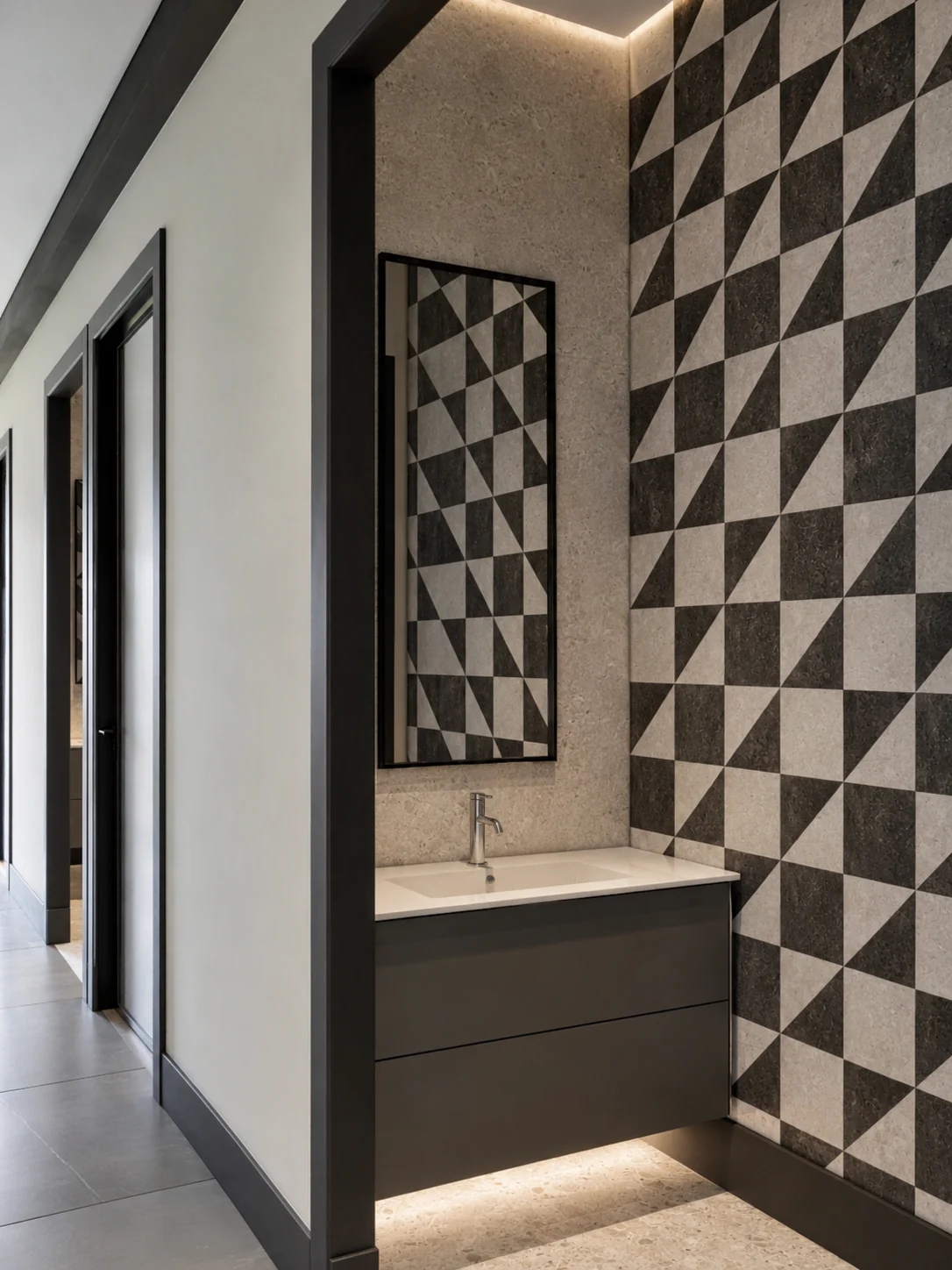 Compact washroom with geometric tile wall
