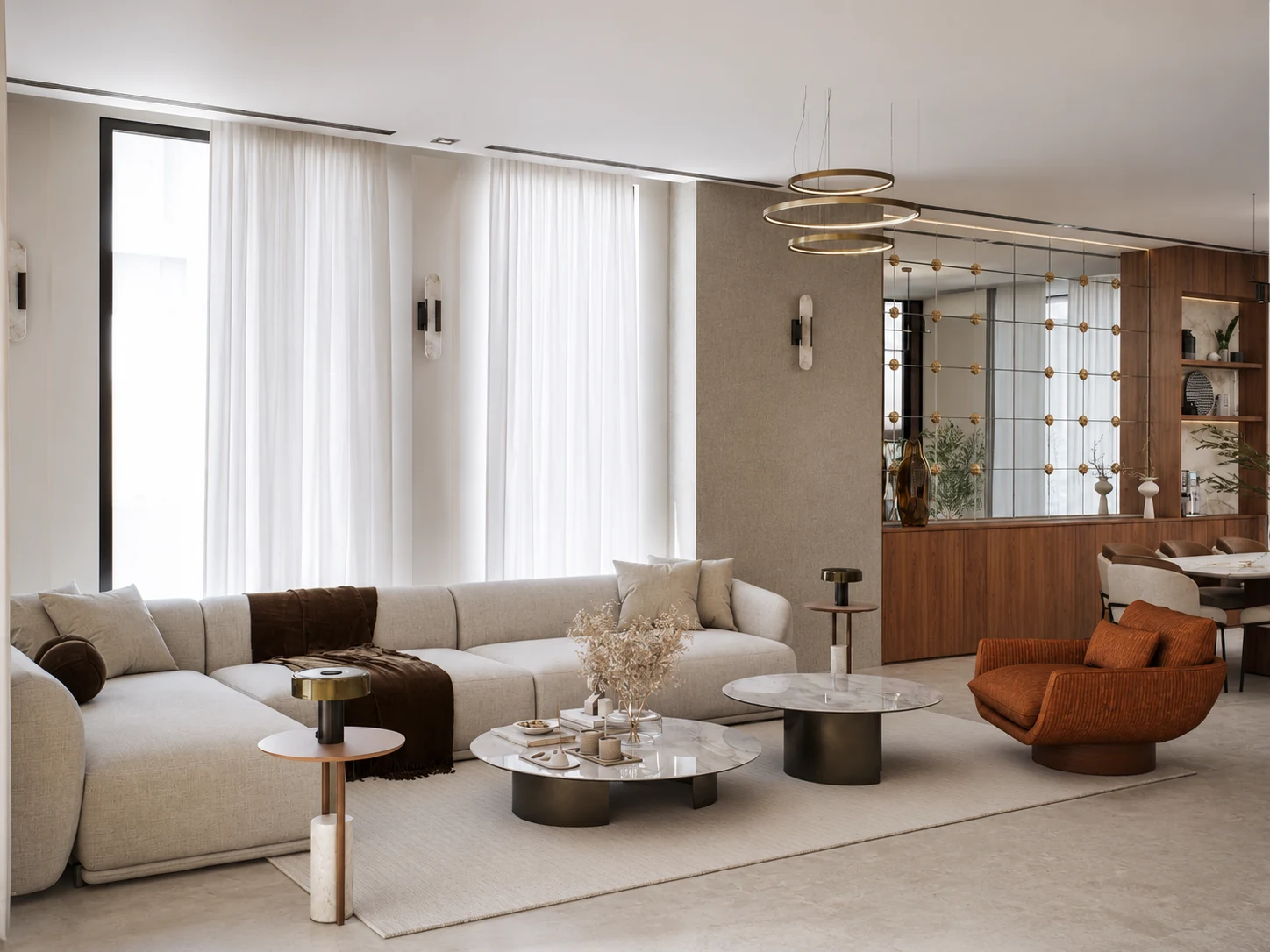 Wide living area with pale stone surfaces and warm timber joinery